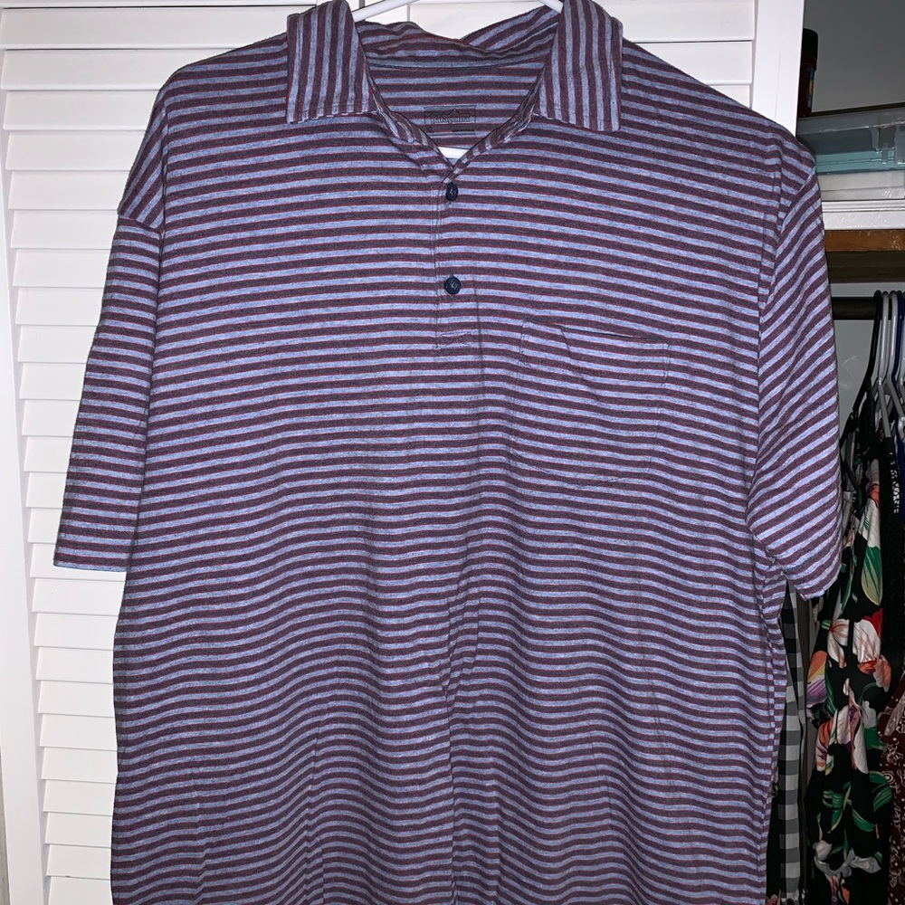 Men’s Patagonia button front shirt with collar.
